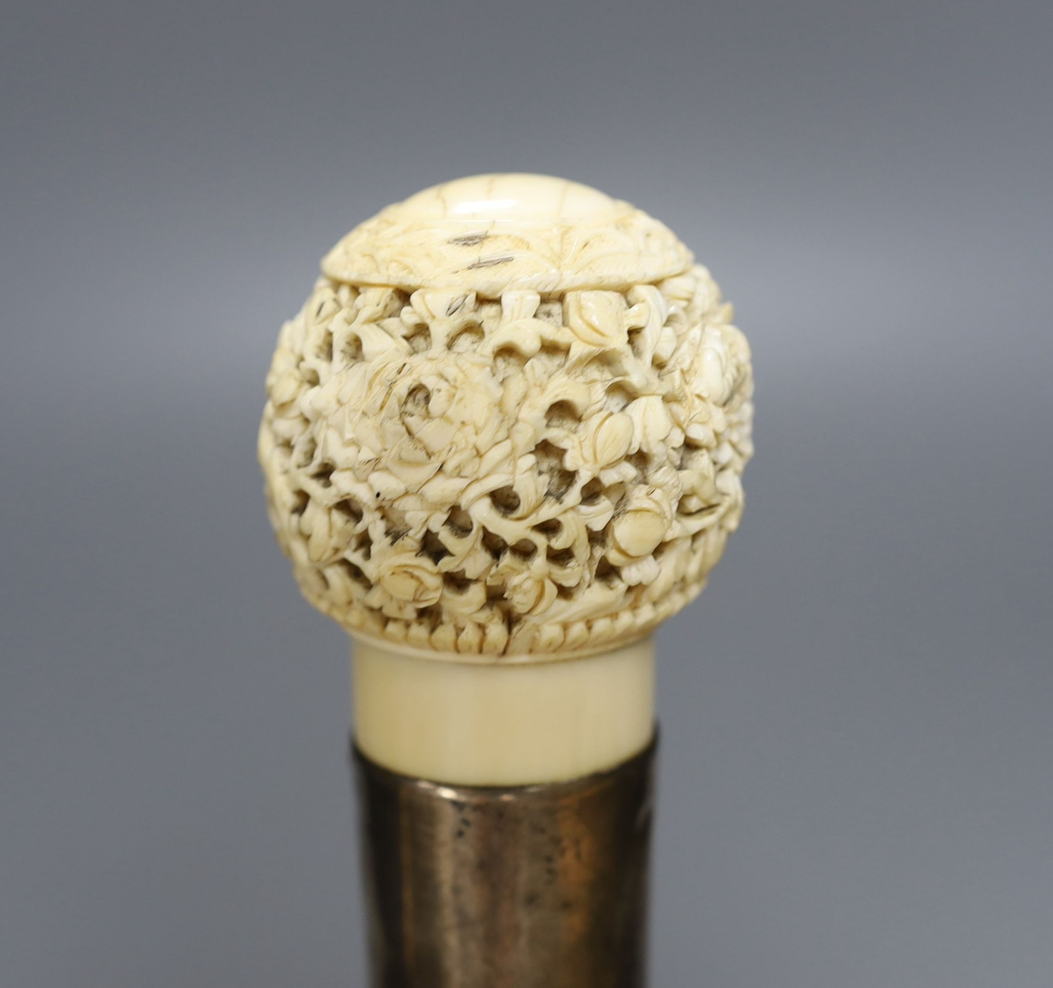 A 19th century carved Cantonese ivory top walking cane - 93cm high